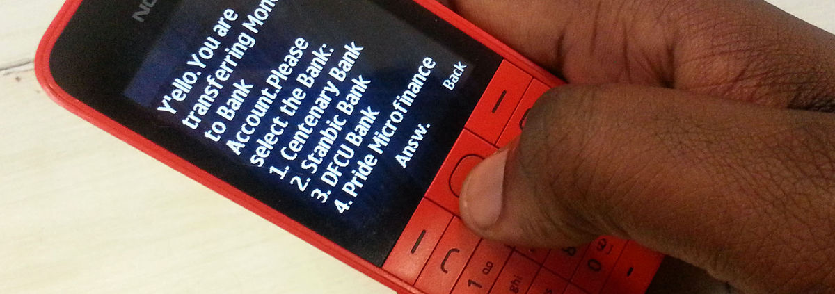 photo of person holding cell phone menu