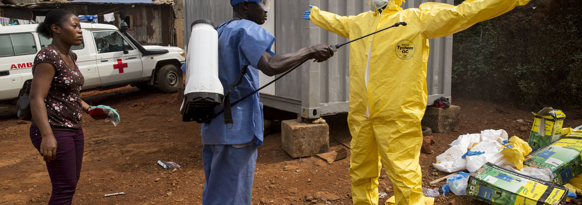 Ebola Worker being sprayed down