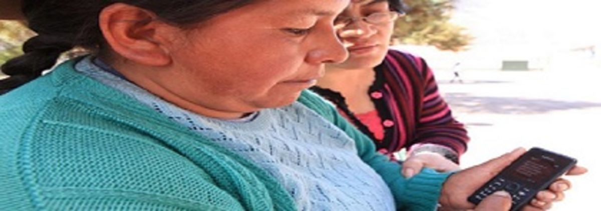 Woman from Peru shows a mobile phone message confirming that her Bim account is up and running.